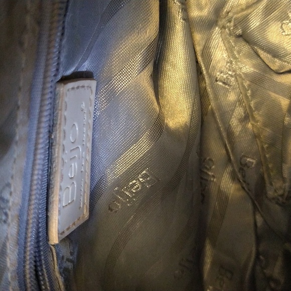 Beijo a pearlized gold color with black straps and trim. - Picture 12 of 14